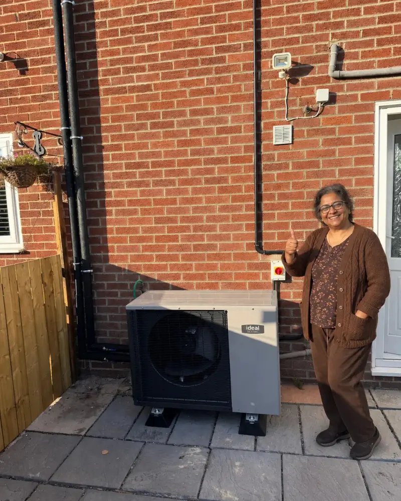 Get Free Quote customer with a professionally installed air source heat pump